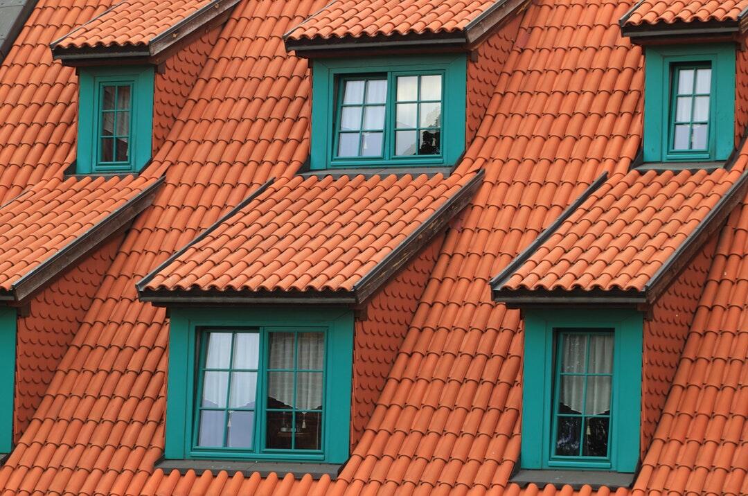 roof repair: expert tips & services for a long-lasting roof in augusta, brown concrete house roof